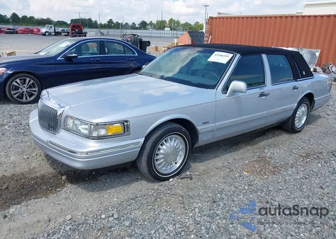 1997 Lincoln Town Car Cartier из США, поврежденный, VIN 1LNLM83W9VY629101